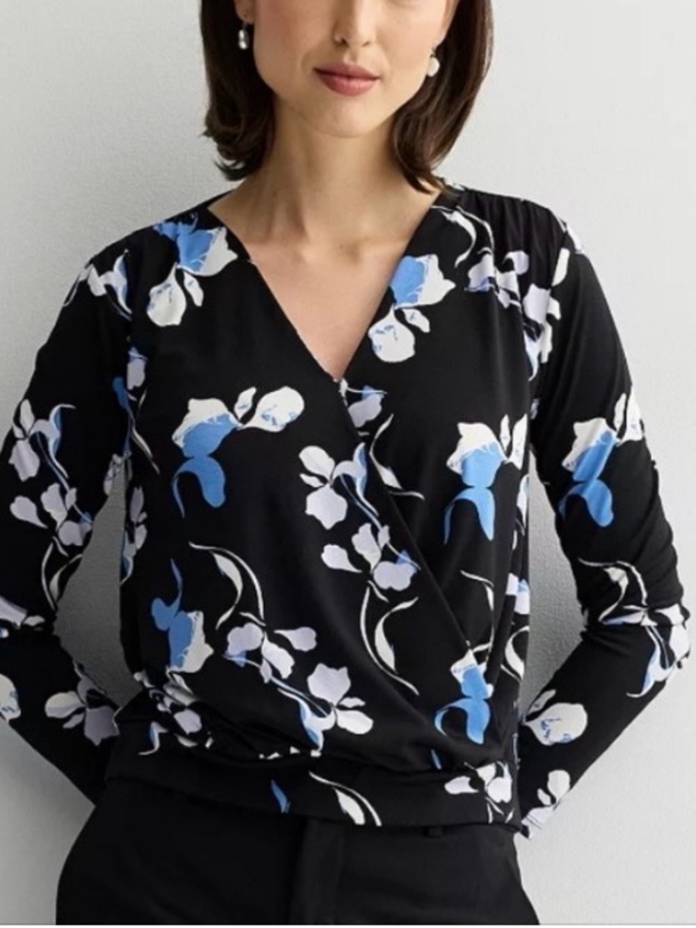 NWOT Nine West Black Wrap Top with Blue and White Floral Accents